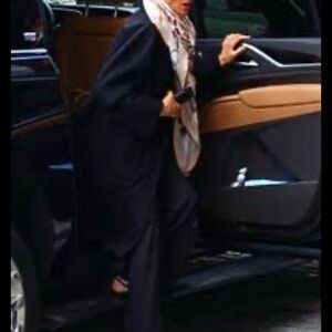 Elegant Black Outfit with Scarf